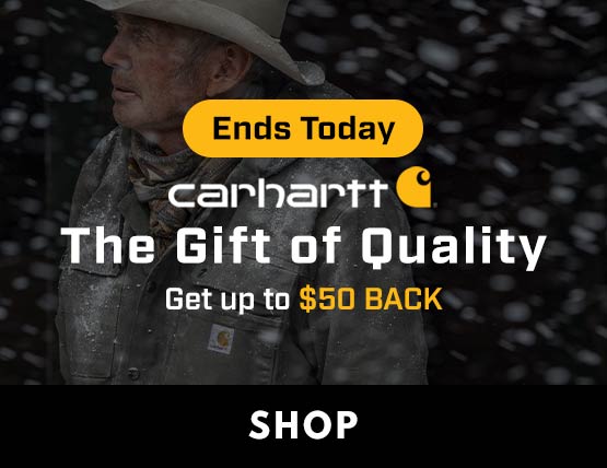 A man in the snow wearing durable Carhartt gear