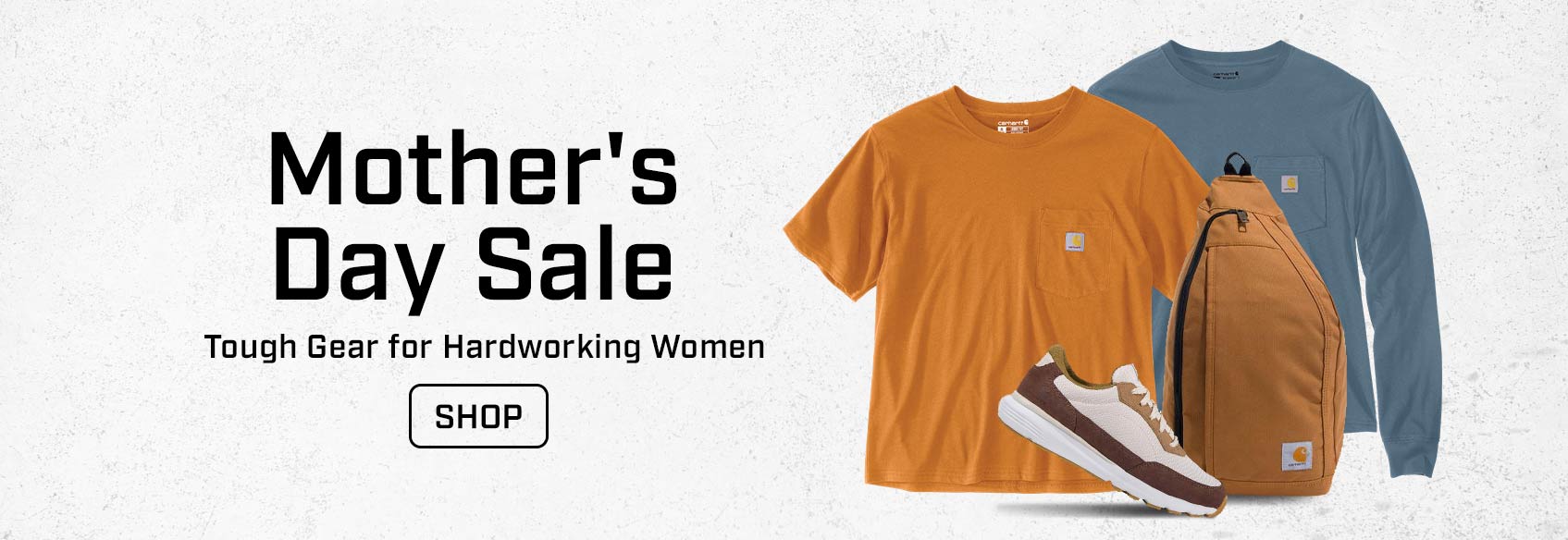 Two woment's t-shirts a bag and a Carhartt sneaker on a white background.
