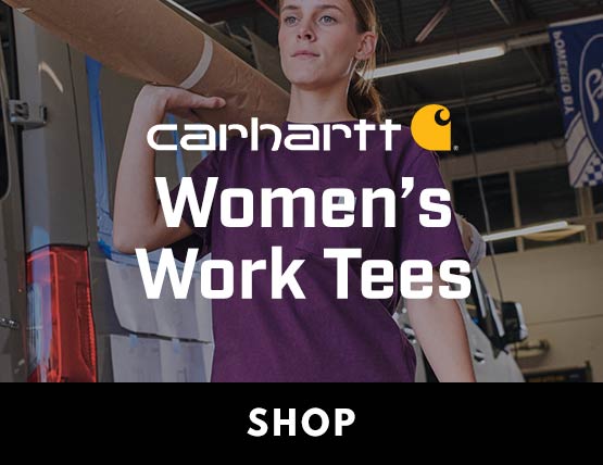 A woman in a purple Carhartt t-shirt carrying a package over her shoulder