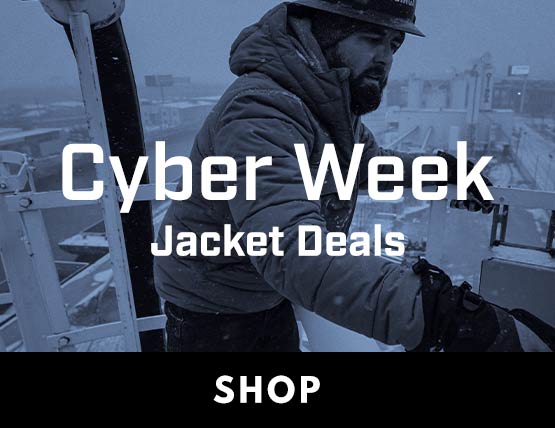 a man working on a jobsite in a Carhartt jacket