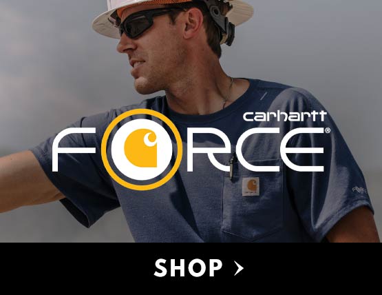 A man wearing a navy Carhartt force t-shirt