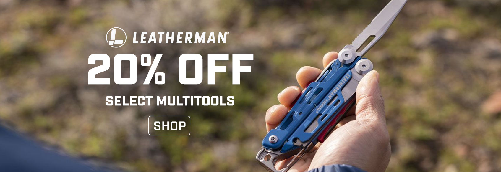 A hand holding a blue Leatherman multitool with the knife blade out - 20% off