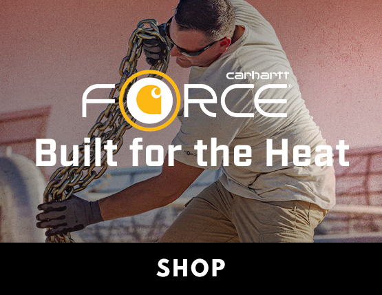 A man holding a heavy chain wearing a Carhartt Force hooded shirt.
