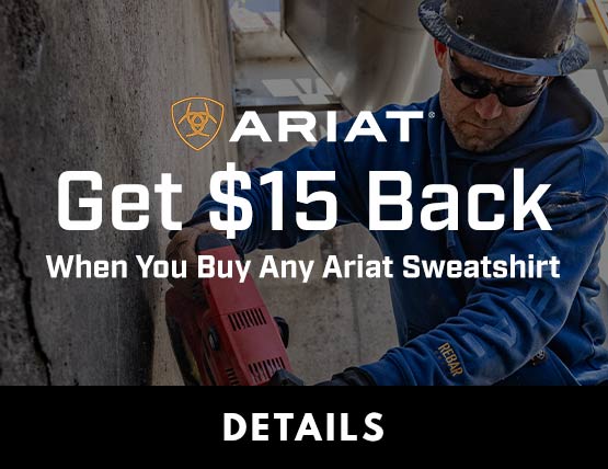 A construction worker wearing a hard hat and a blue Ariat hoodie. 